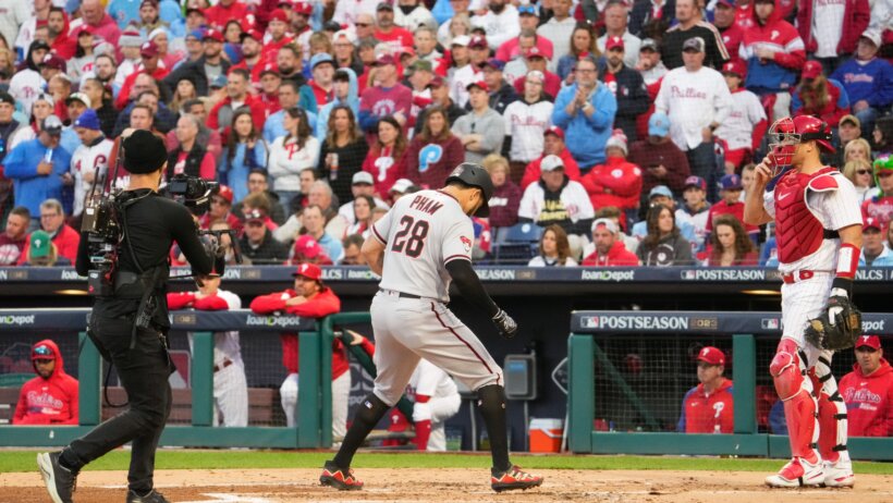 Arizona Diamondbacks left fielder Tommy Pham arrives at home plate after hitting a home run against the Philadelphia Phillies