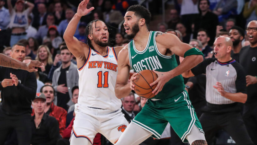 Boston Celtics forward Jayson Tatum is guarded by New York Knicks guard Jalen Brunson