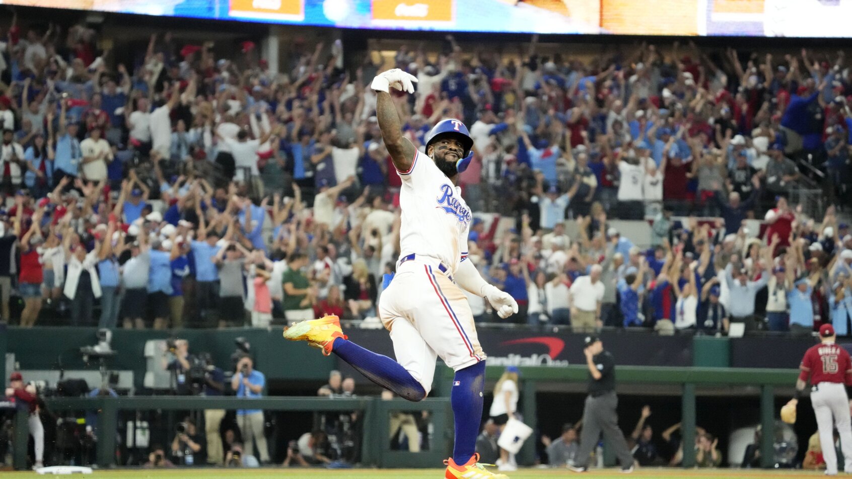 Texas Rangers Adolis Garcia rounding the bases after a walk-off home run