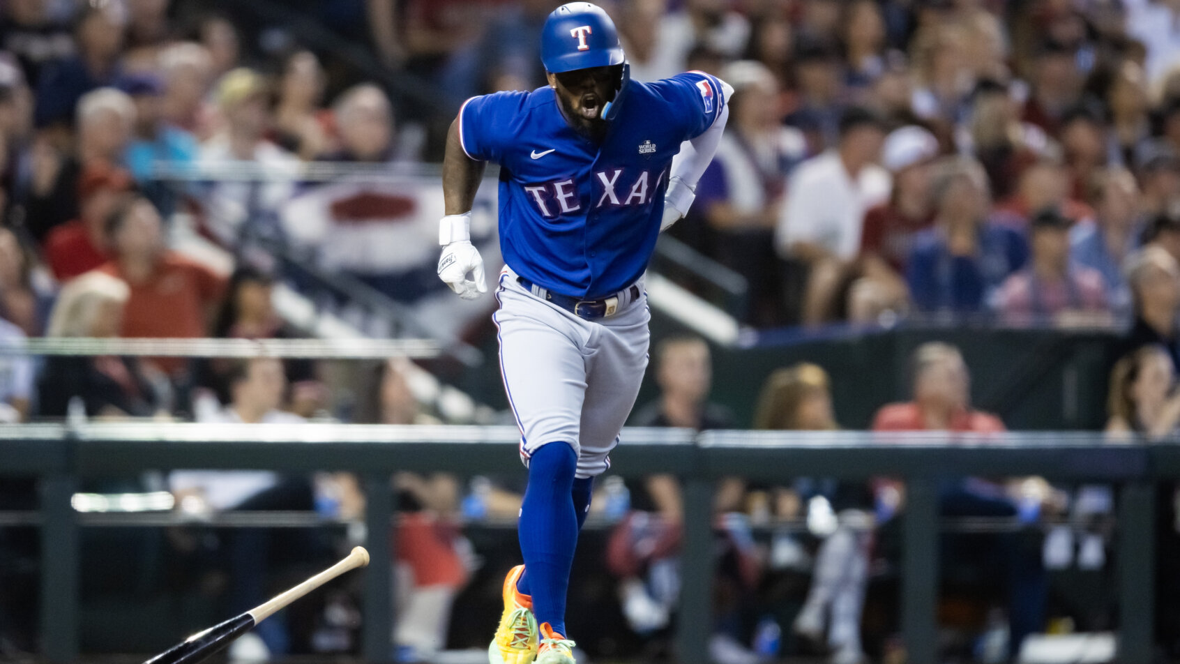 Texas Rangers right fielder Adolis Garcia reacts to an injury in Game 3 of the 2023 World Series