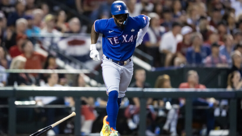 Texas Rangers right fielder Adolis Garcia reacts to an injury in Game 3 of the 2023 World Series