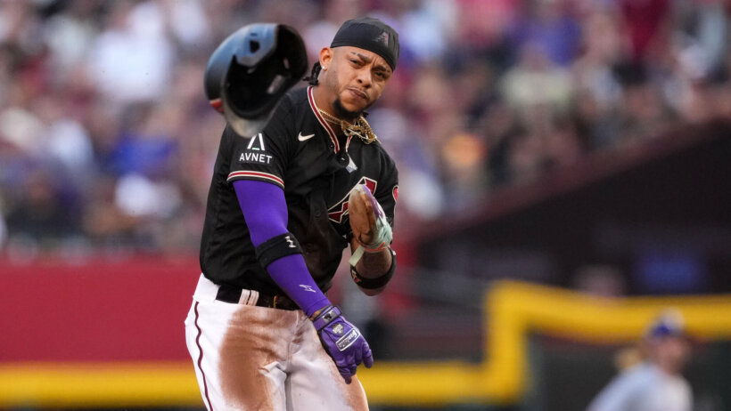 Arizona Diamondbacks second baseman Ketel Marte throws his helmet in disgust