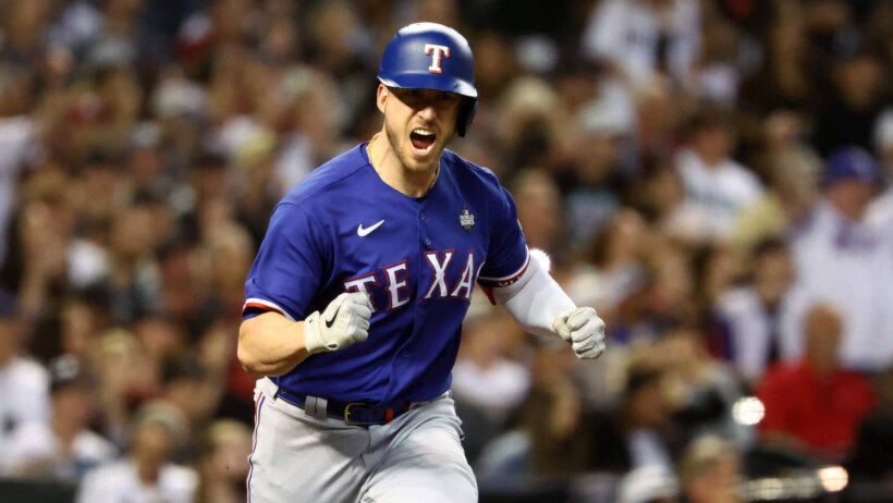 Texas Rangers catcher Mitch Garver celebrating an RBI single