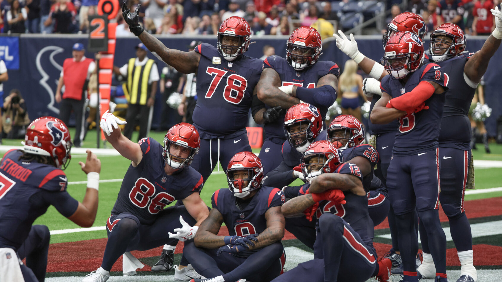 Houston Texans quarterback C.J. Stroud (7) celebrates the Texans touchdown by taking a picture of the offense