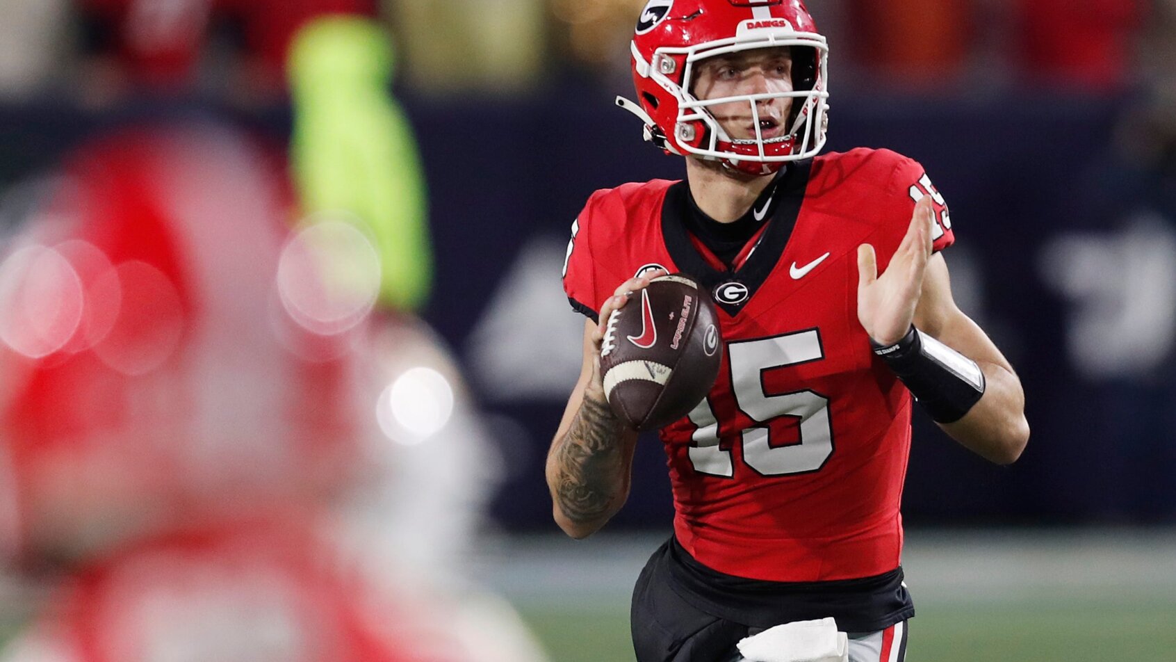 Georgia quarterback Carson Beck looks to throw a pass