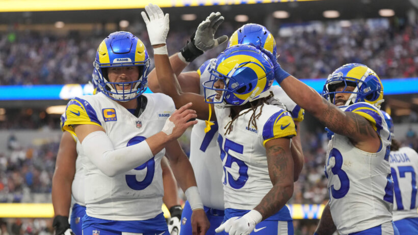 Los Angeles Rams wide receiver Demarcus Robinson (15) celebrates with quarterback Matthew Stafford (9) and running back Kyren Williams (23)