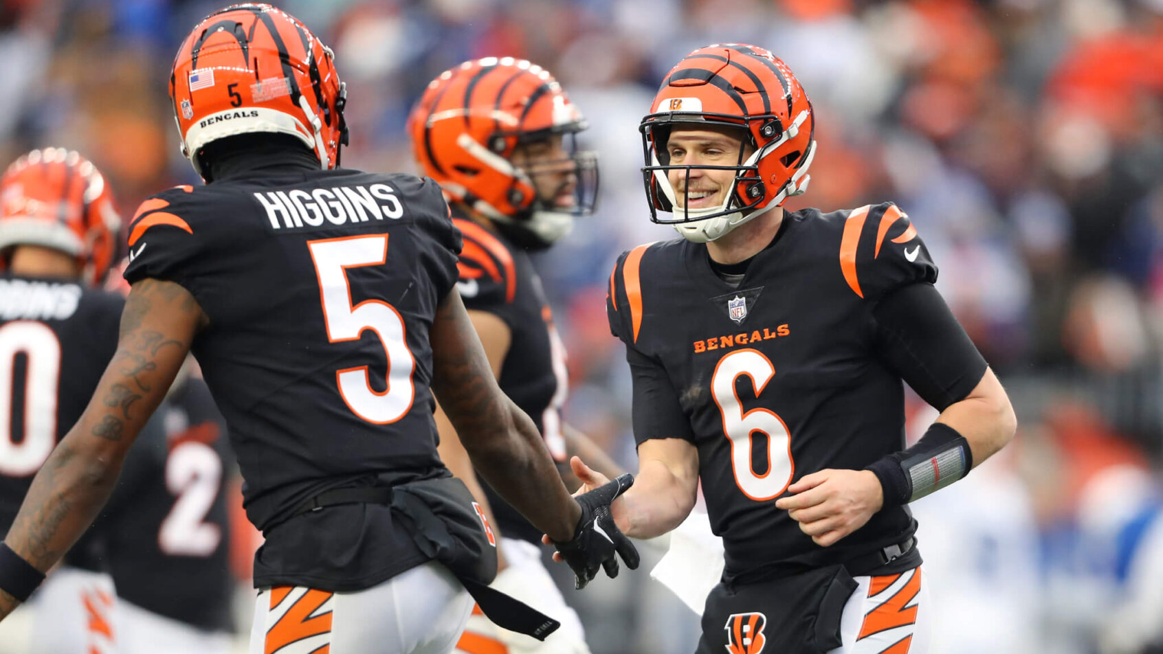 Cincinnati Bengals quarterback Jake Browning (6) celebrates his touchdown run