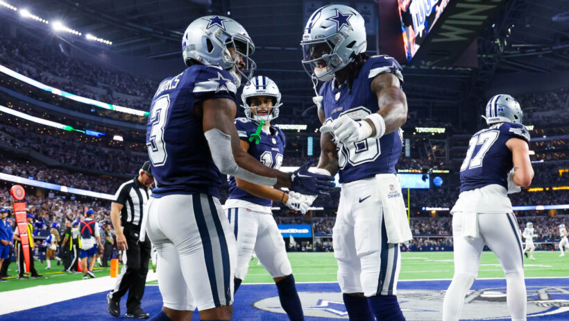 Dallas Cowboys wide receiver Brandin Cooks (3) celebrates with Dallas Cowboys wide receiver CeeDee Lamb (88) after making a touchdown catch