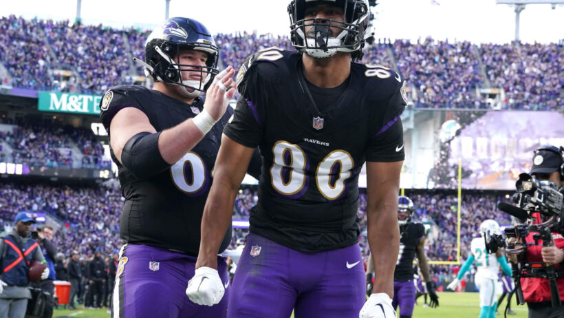 Baltimore Ravens tight end Isaiah Likely (80) greeted by center Tyler Linderbaum (64) following his second quarter touchdown