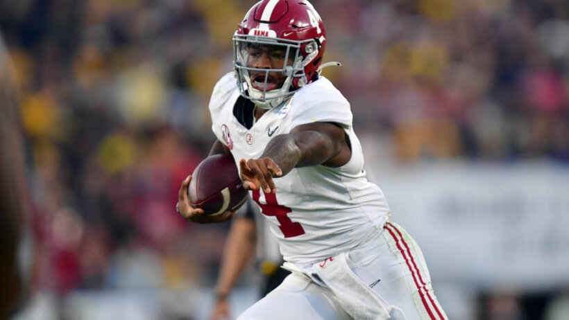 Alabama Crimson Tide quarterback Jalen Milroe runs the football