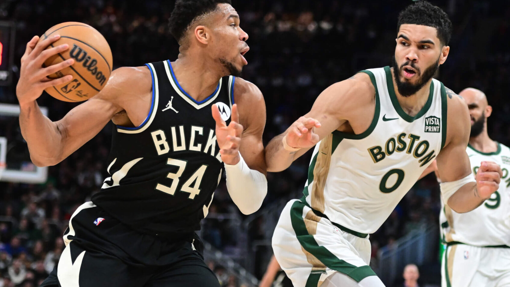 Milwaukee Bucks forward Giannis Antetokounmpo drives for the basket against Boston Celtics forward Jayson Tatum