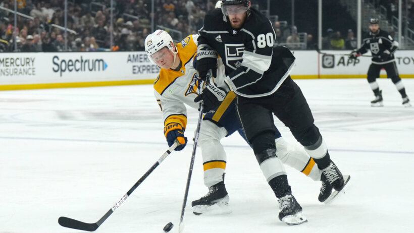 LA Kings center Pierre-Luc Dubois and Nashville Predators center Juuso Parssinen