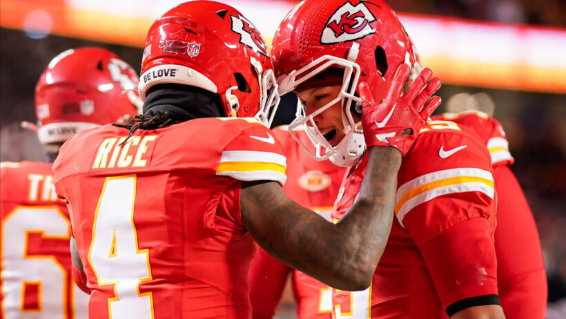 Kansas City Chiefs quarterback Patrick Mahomes (15) celebrates with wide receiver Rashee Rice (4)