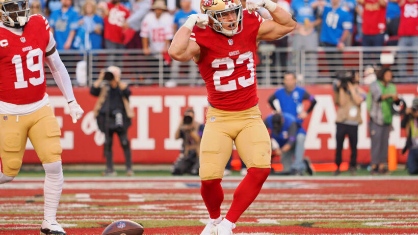 San Francisco 49ers running back Christian McCaffrey (23) celebrates after scoring a touchdown