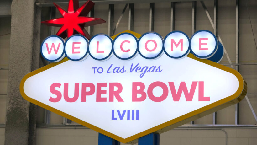 A Welcome to Las Vegas Super Bowl 58 at team arrivals at the Harry Reid International Airport.