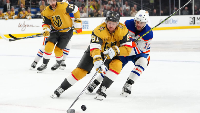 Vegas Golden Knights right wing Jonathan Marchessault controls the puck ahead of Edmonton Oilers center Derek Ryan