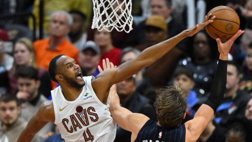 Cleveland Cavaliers forward Evan Mobley blocks a shot by Orlando Magic forward Moritz Wagner