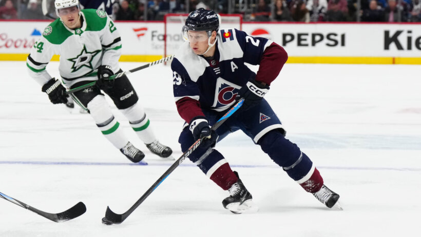 Colorado Avalanche center Nathan MacKinnon controls the puck in the second period against the Dallas Stars at Ball Arena