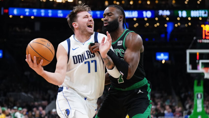 Dallas Mavericks guard Luka Doncic drives to the basket against Boston Celtics guard Jaylen Brown