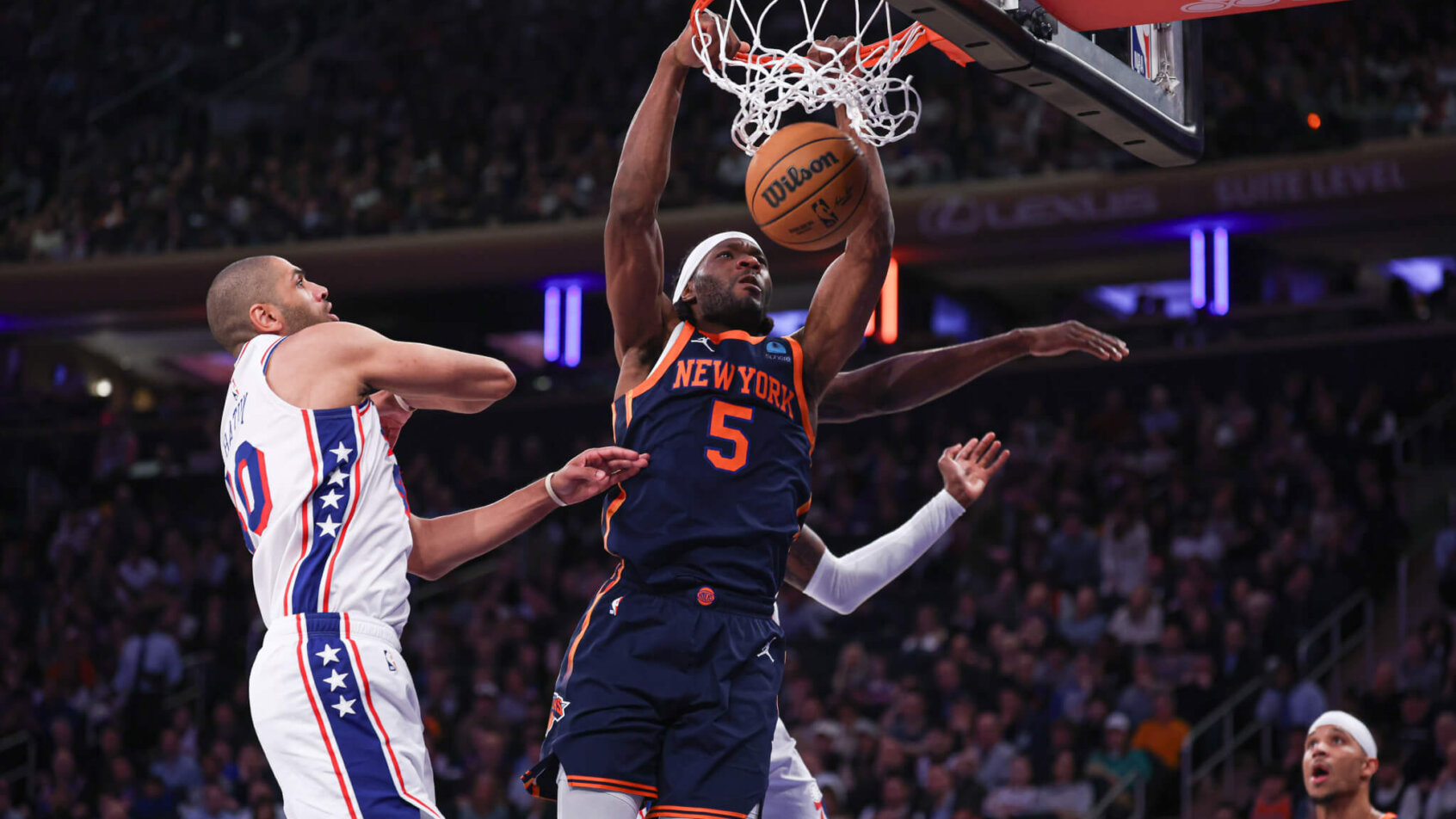 New York Knicks forward Precious Achiuwa dunks against the Philadelphia 76ers