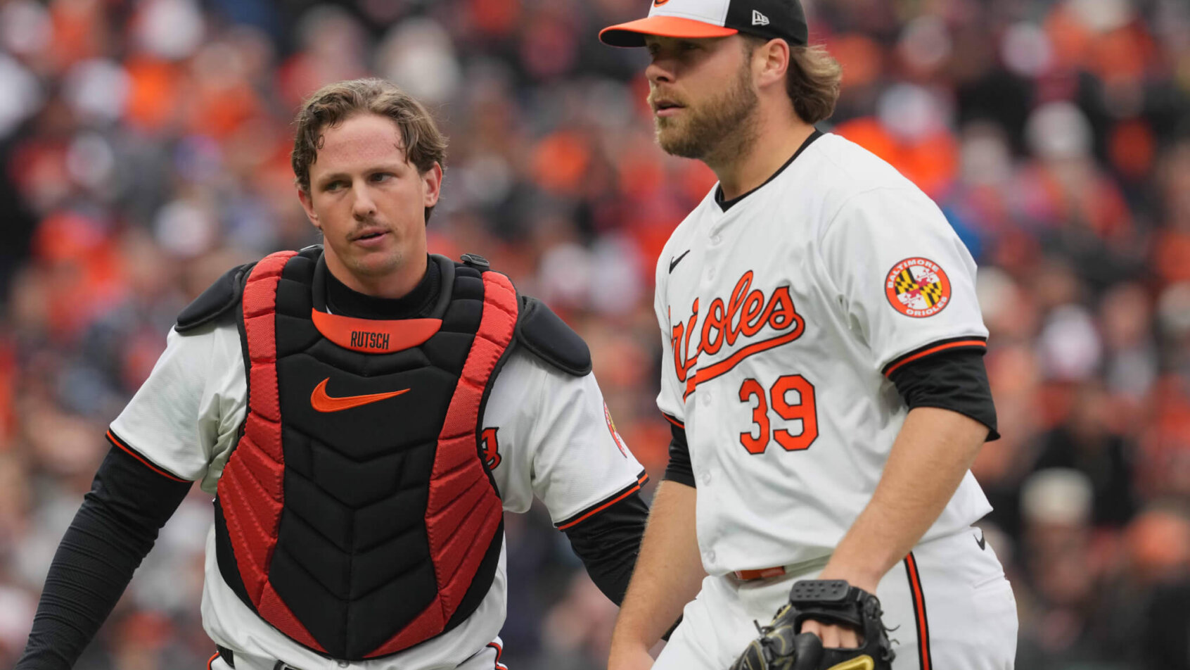 Baltimore Orioles pitcher Corbin Burnes and catcher Adley Rutschman after a win
