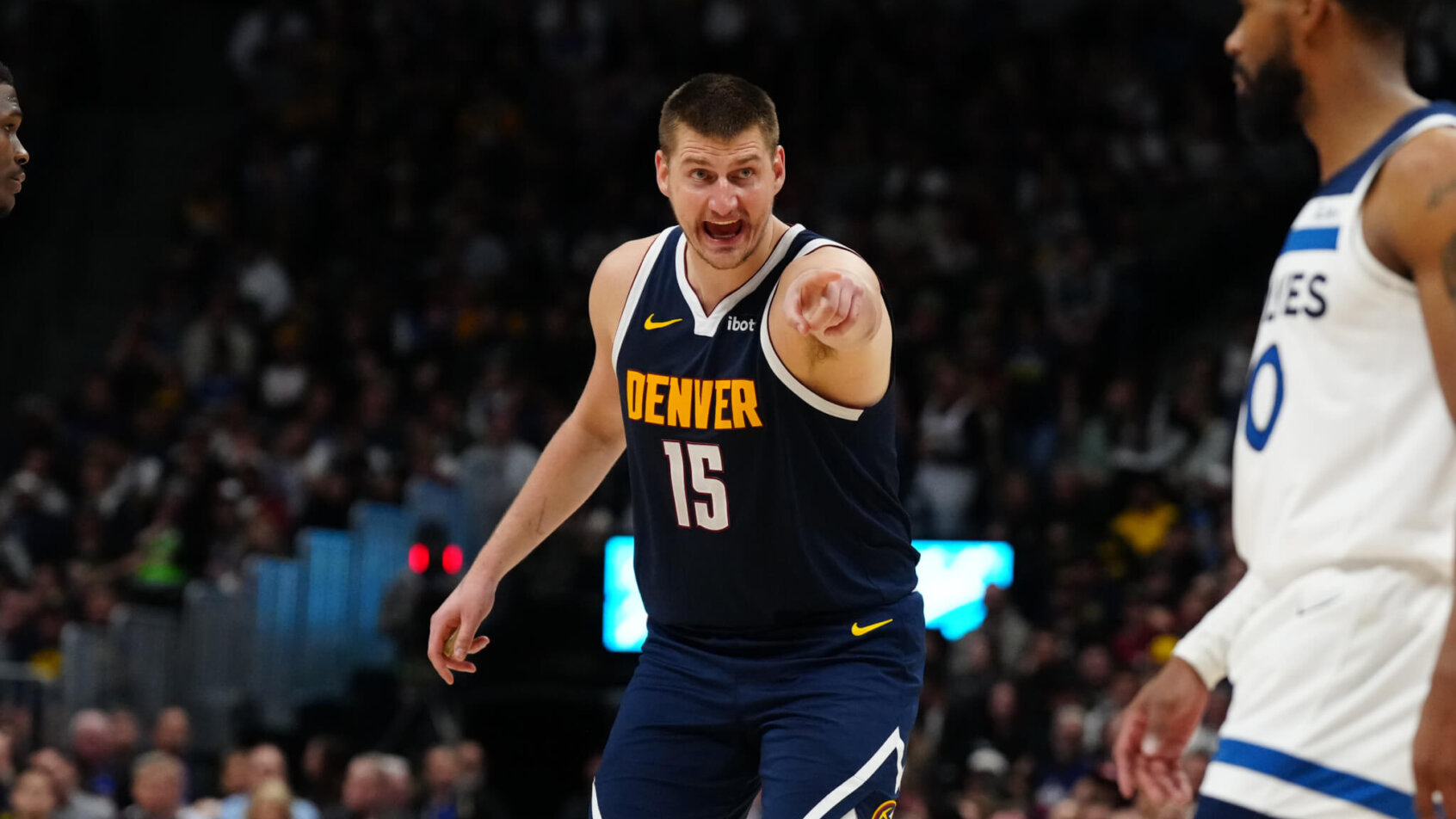 Denver Nuggets center Nikola Jokic pointing and yelling against the Minnesota Timberwolves