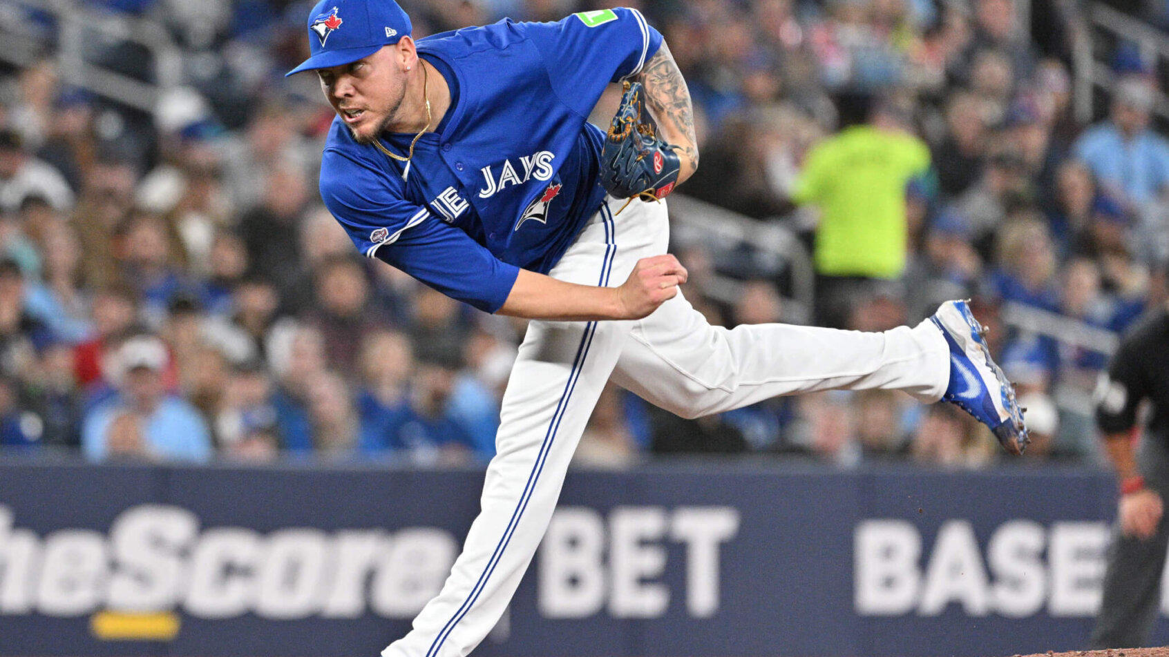 Toronto Blue Jays starting pitcher Yariel Rodriguez delivering to home plate