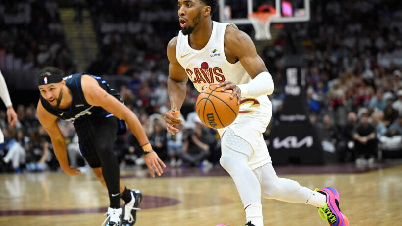 Cleveland Cavaliers guard Donovan Mitchell drives to the hoop against the Orlando Magic