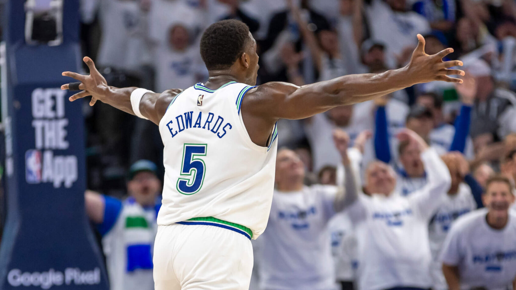 Minnesota Timberwolves guard Anthony Edwards celebrates a basket