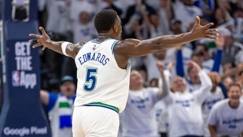 Minnesota Timberwolves guard Anthony Edwards celebrates a basket