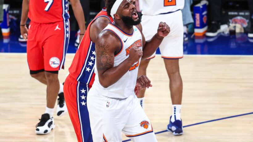 New York Knicks center Mitchell Robinson reacting to a foul call