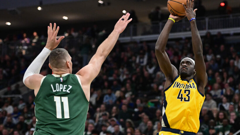 Indiana Pacers forward Pascal Siakam shoots the ball over Milwaukee Bucks center Brook Lopez