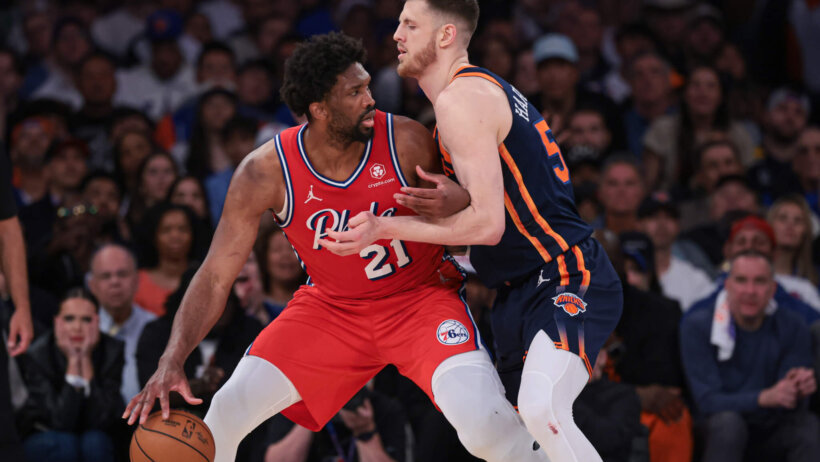 Philadelphia 76ers center Joel Embiid backs down New York Knicks center Isaiah Hartenstein
