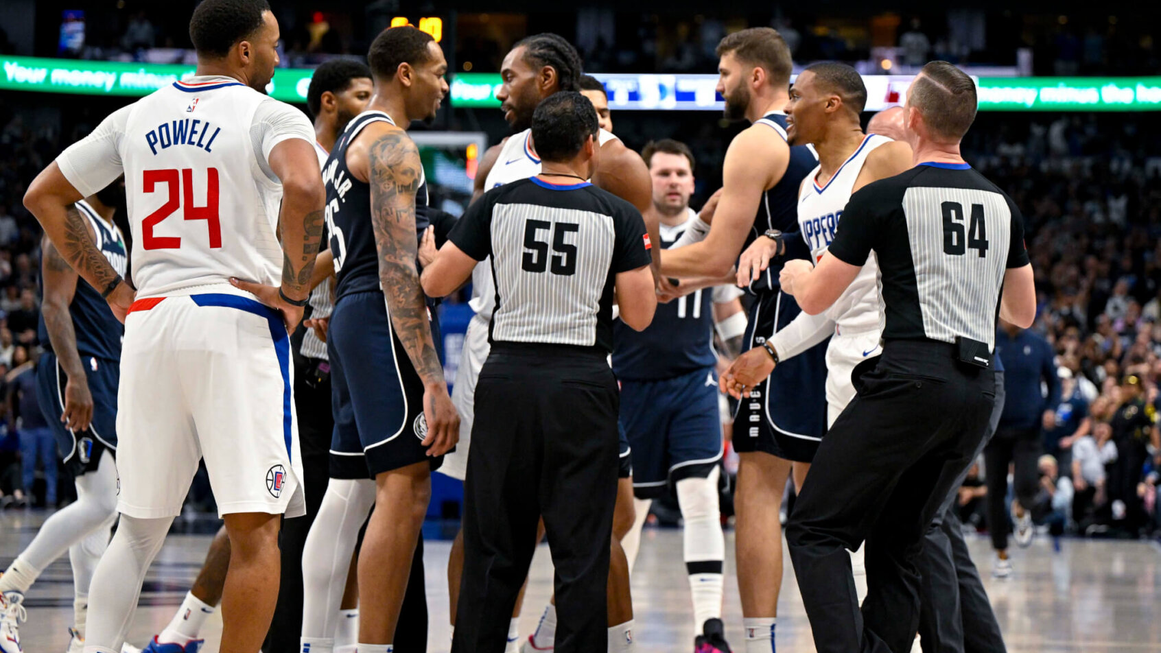 LA Clippers and Dallas Mavericks players in each other's faces
