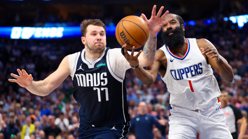 Dallas Mavericks guard Luka Doncic and LA Clippers guard James Harden going after a loose ball