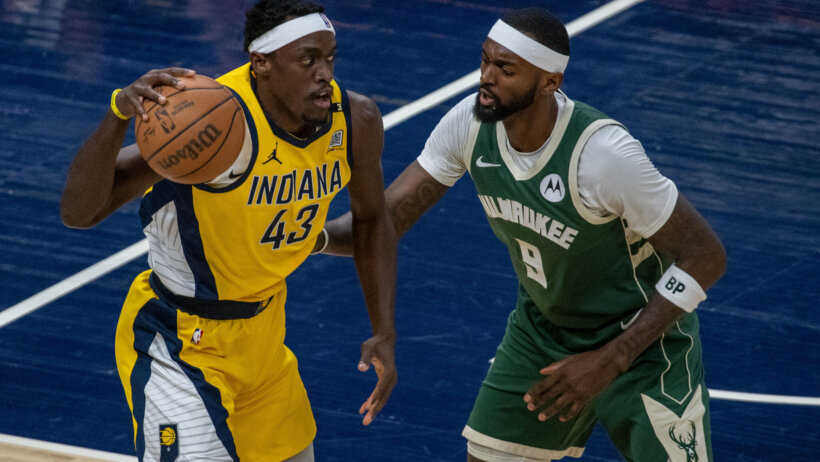 Indiana Pacers forward Pascal Siakam holds off Milwaukee Bucks forward Bobby Portis