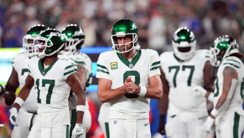 New York Jets QB Aaron Rodgers on the field
