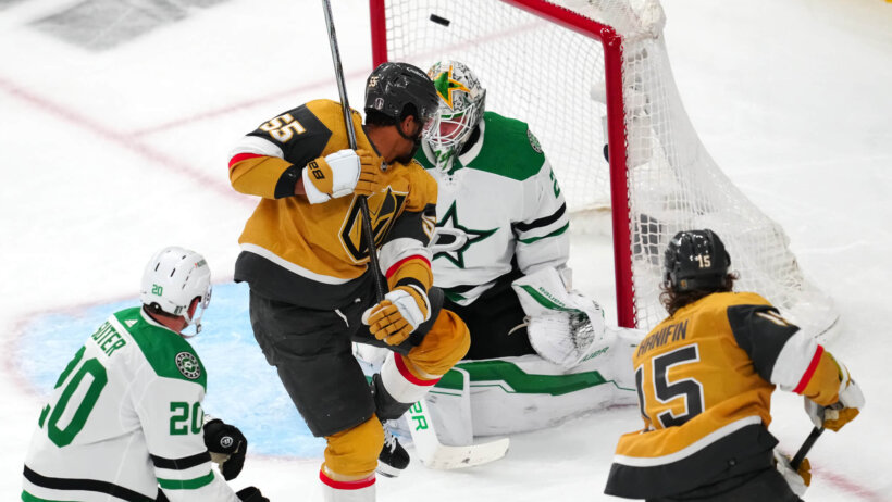 Vegas Golden Knights defenseman Noah Hanifin scores the winning goal against Dallas Stars goaltender Jake Oettinger