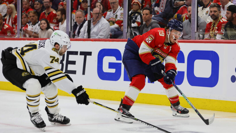 Florida Panthers left wing Matthew Tkachuk moves the puck as Boston Bruins left wing Jake DeBrusk