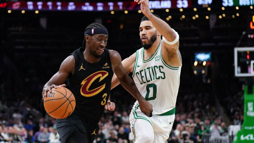 Cleveland Cavaliers guard Caris LeVert drives the ball against Boston Celtics forward Jayson Tatum