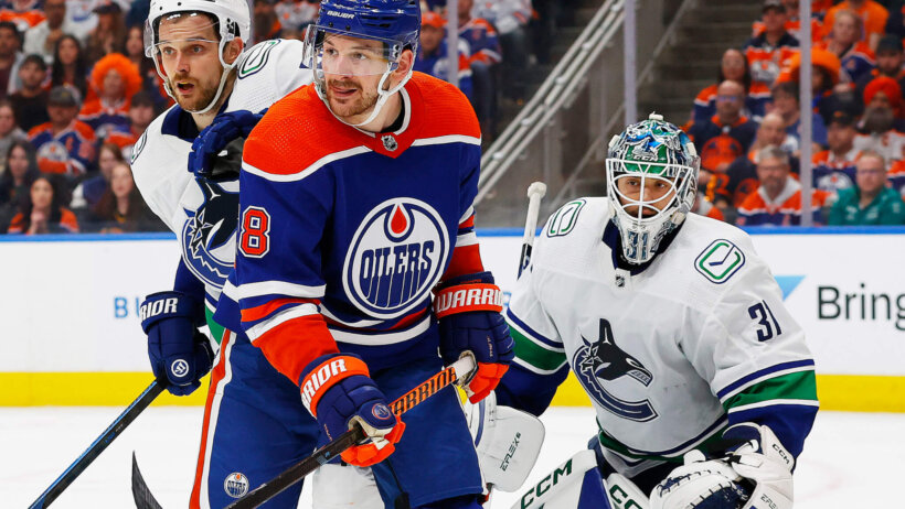 Zach Hyman in front of Canucks goalie