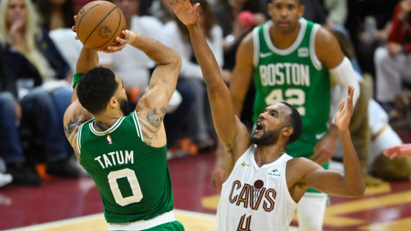 Jayson Tatum rises up to shoot over Evan Mobley in Game 4 of the Eastern Conference Semis.
