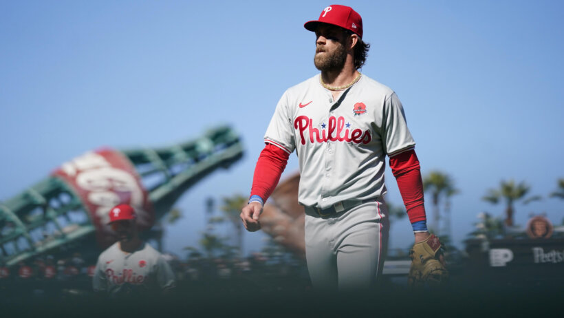 Bryce Harper of the Philadelphia Phillies heads to the dugout during a game against the San Francisco Giants.