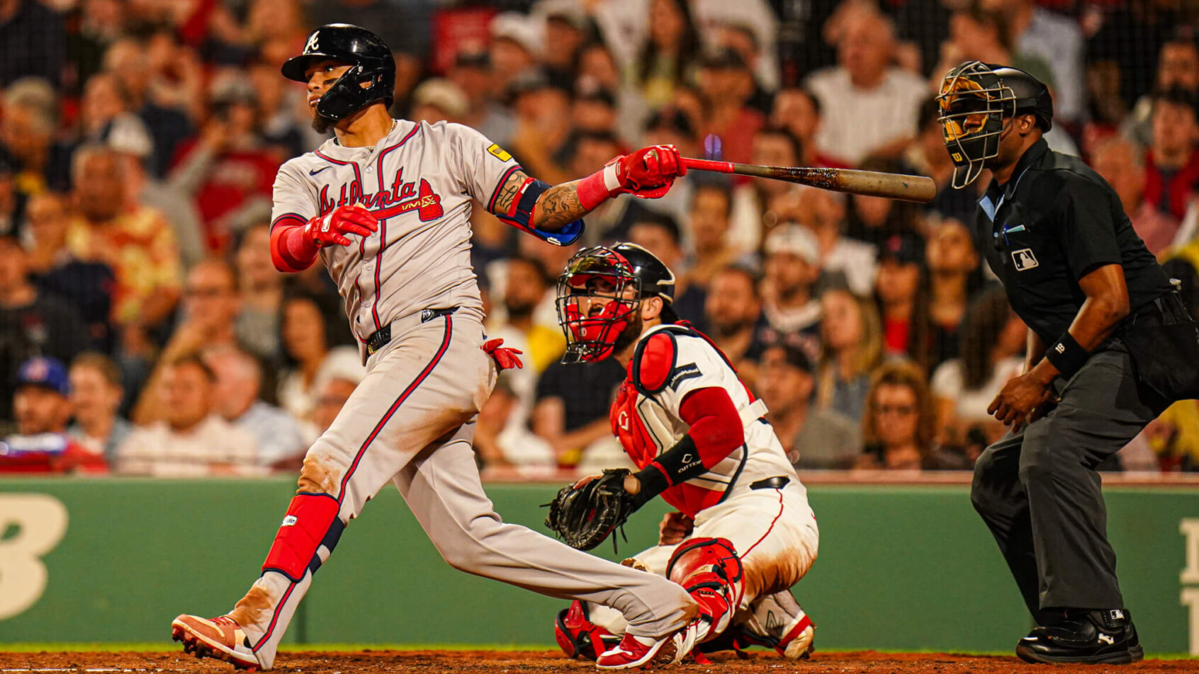 Atlanta Braves shortstop Orlando Arcia hitting a single against the Boston Red Sox
