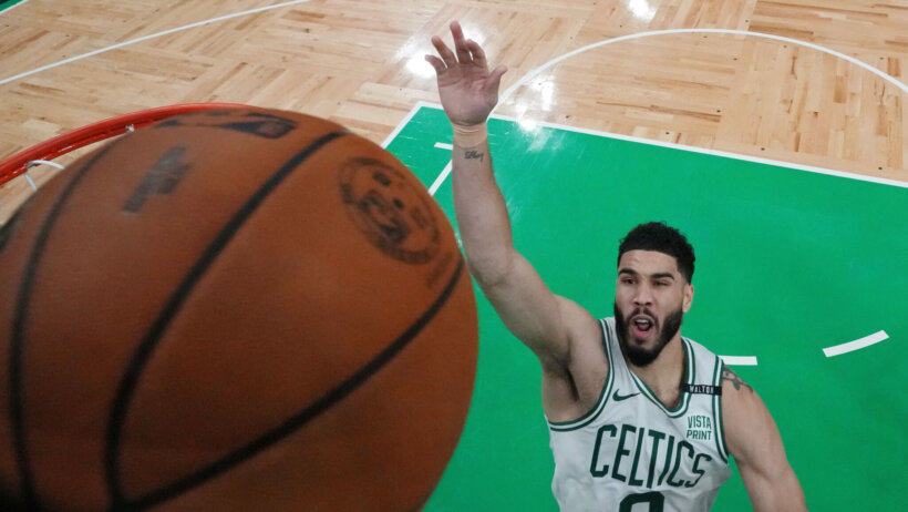 Boston Celtics forward Jayson Tatum shooting a floater