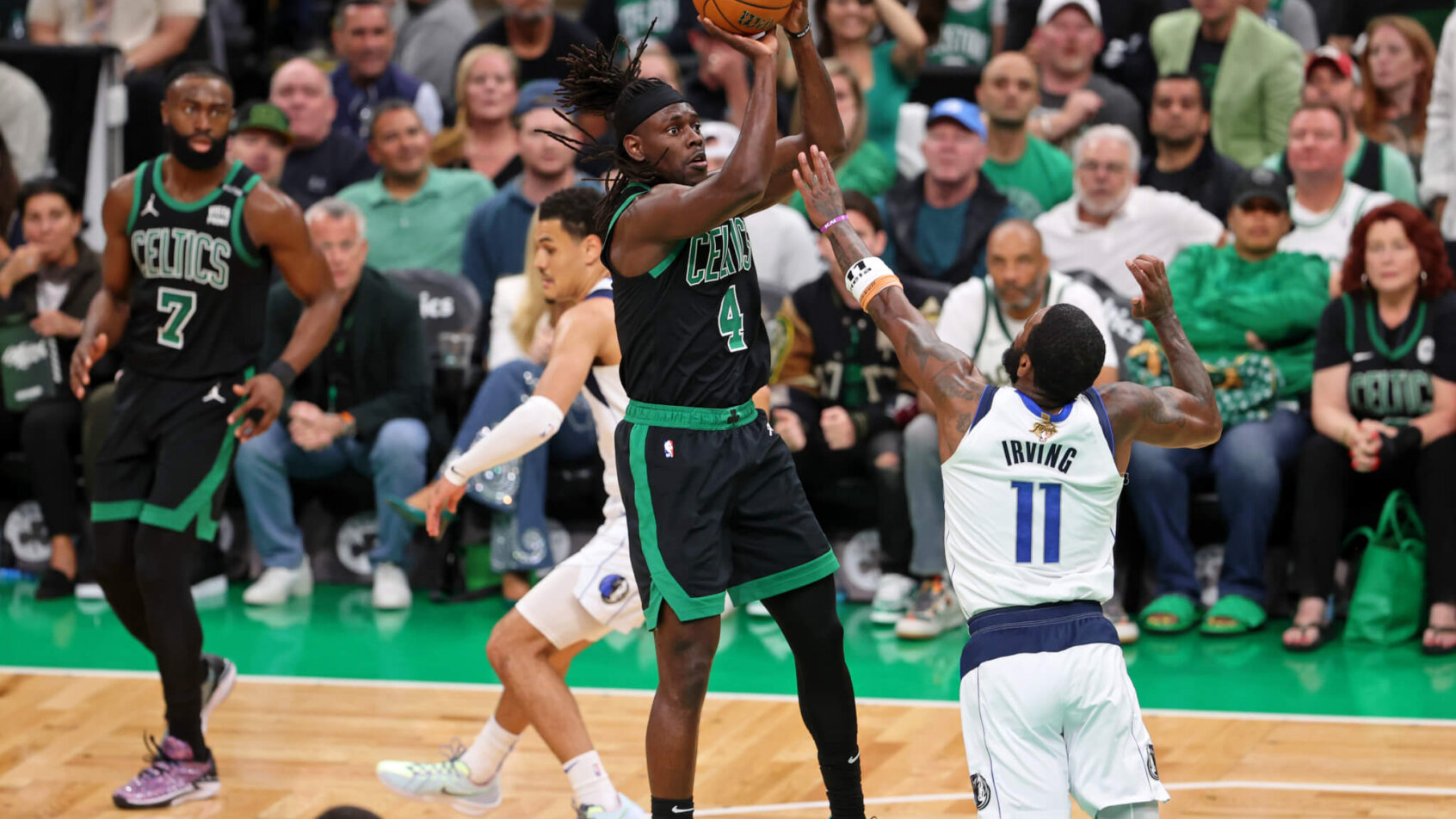Jrue Holiday shoots over Kyrie Irving in Game 2 of the NBA Finals.