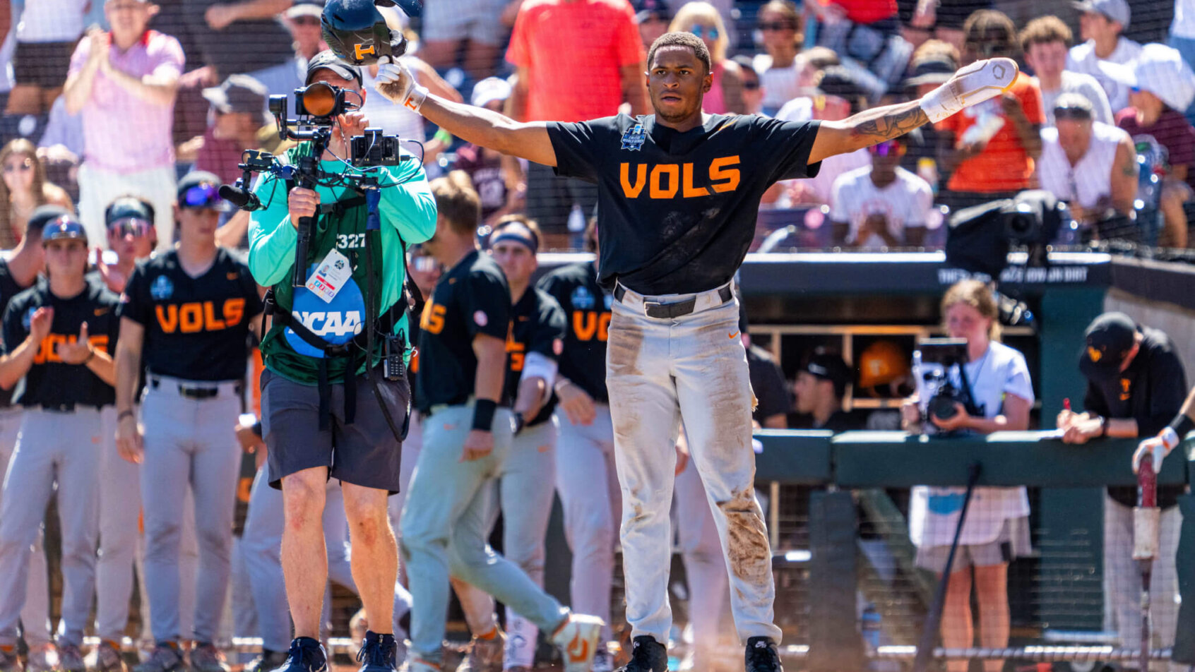 Tennessee Volunteers second baseman Christian Moore celebrates after a two-run home run by left fielder Dylan Dreiling