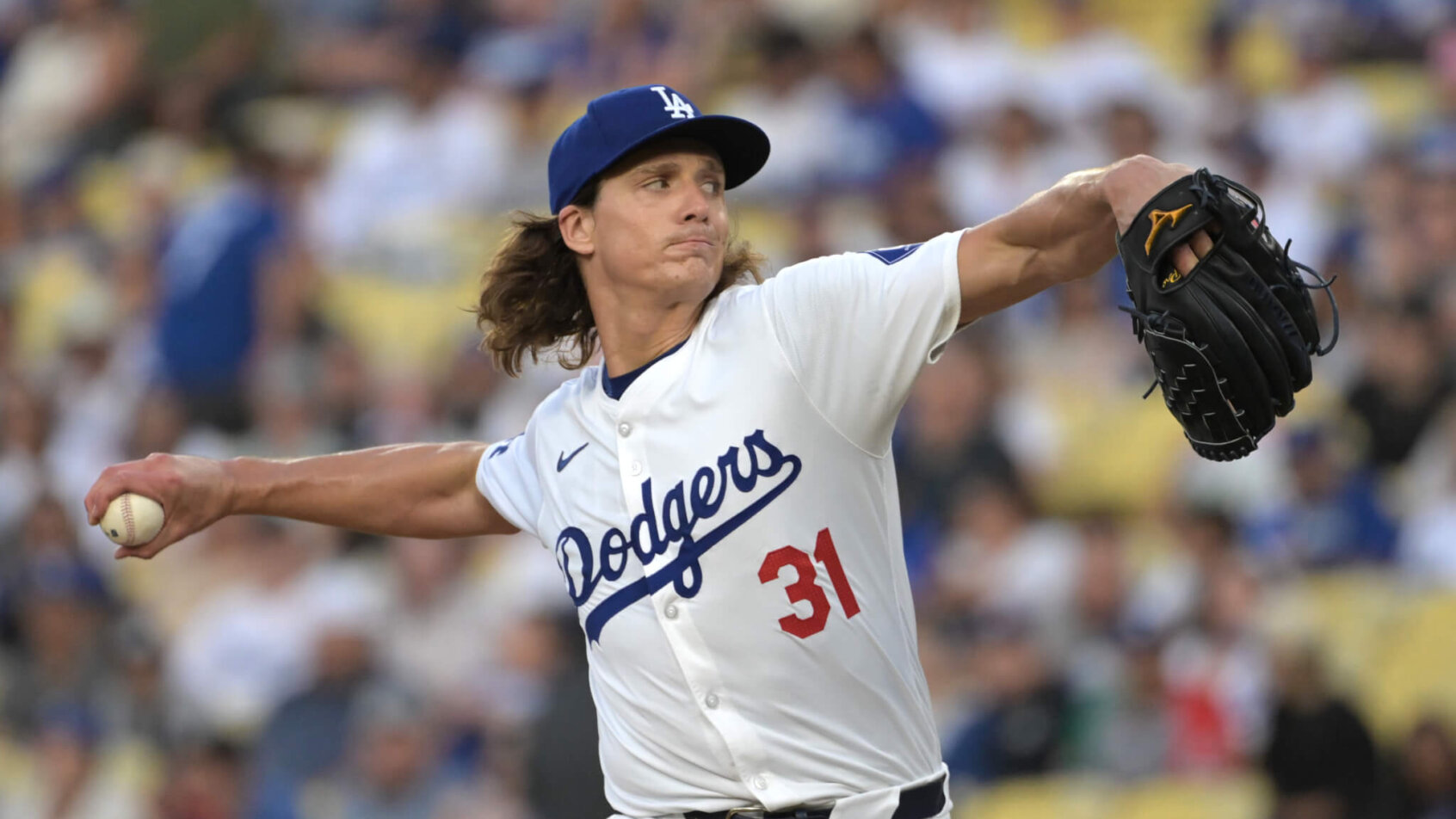 Tyler Glasnow of the Los Angeles Dodgers delivers a pitch to home plate during a game against the San Francisco Giants.