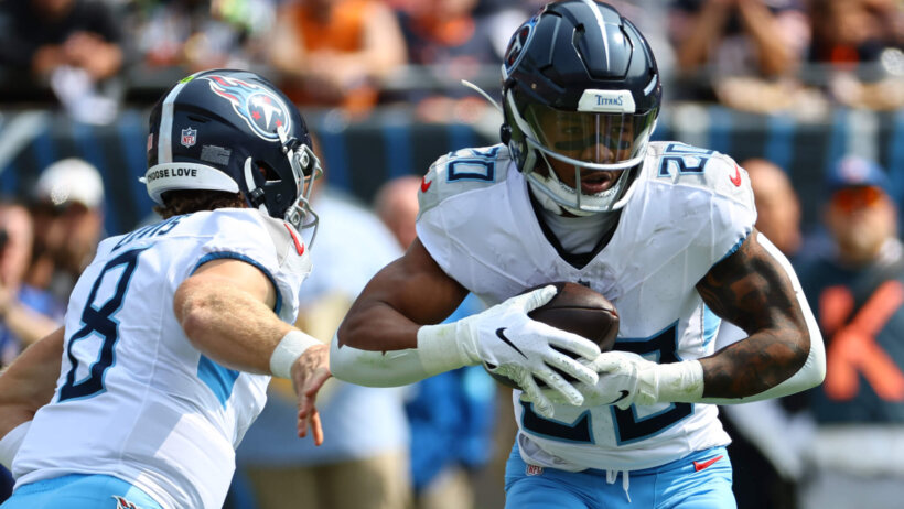 Tennessee Titans running back Tony Pollard rushes the ball against the Chicago Bears