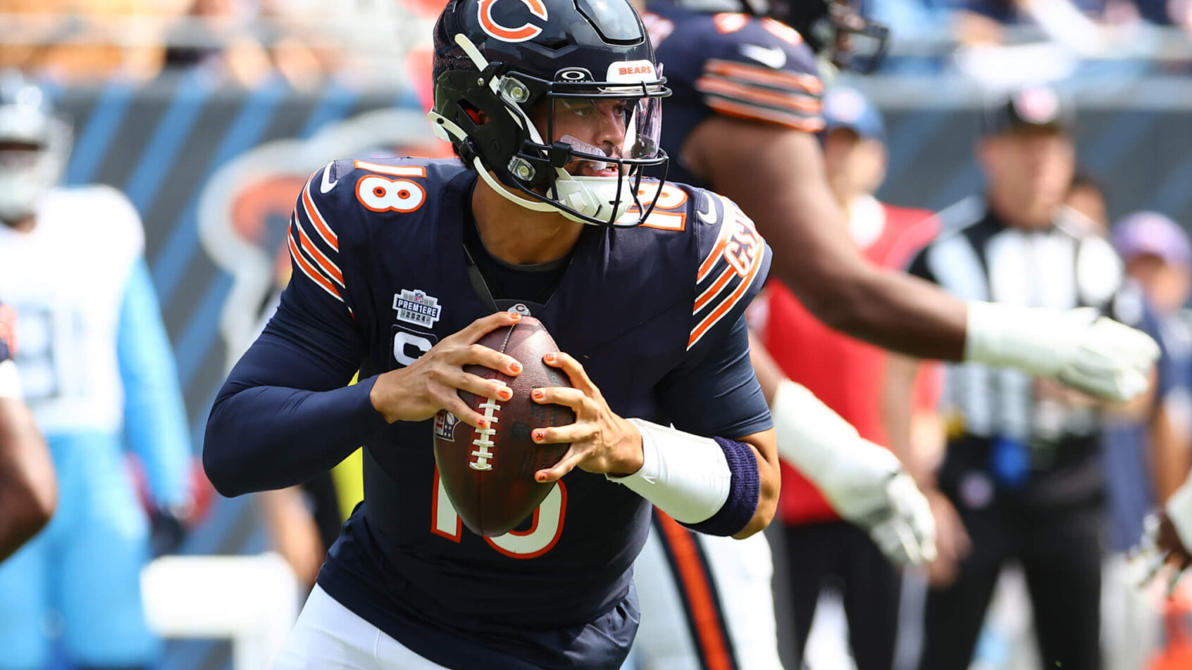 Chicago Bears quarterback Caleb Williams drops back to pass